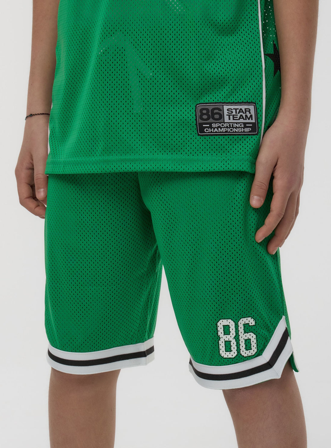 Pantaloncini in rete stile basket