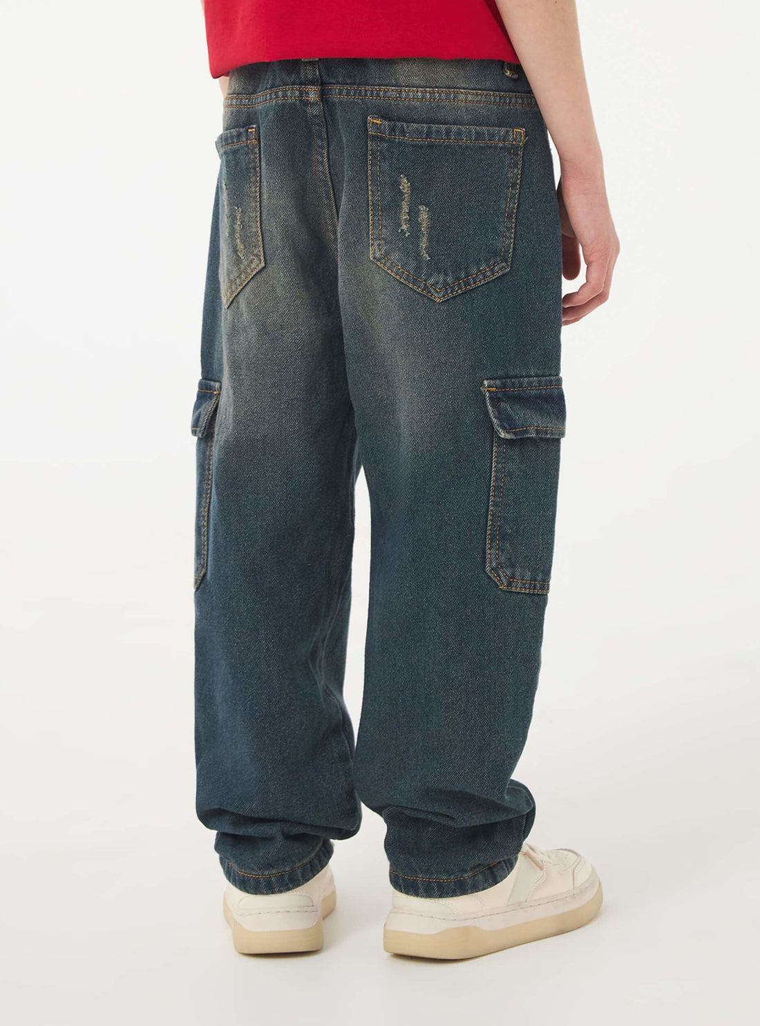 Jeans cargo con strappi