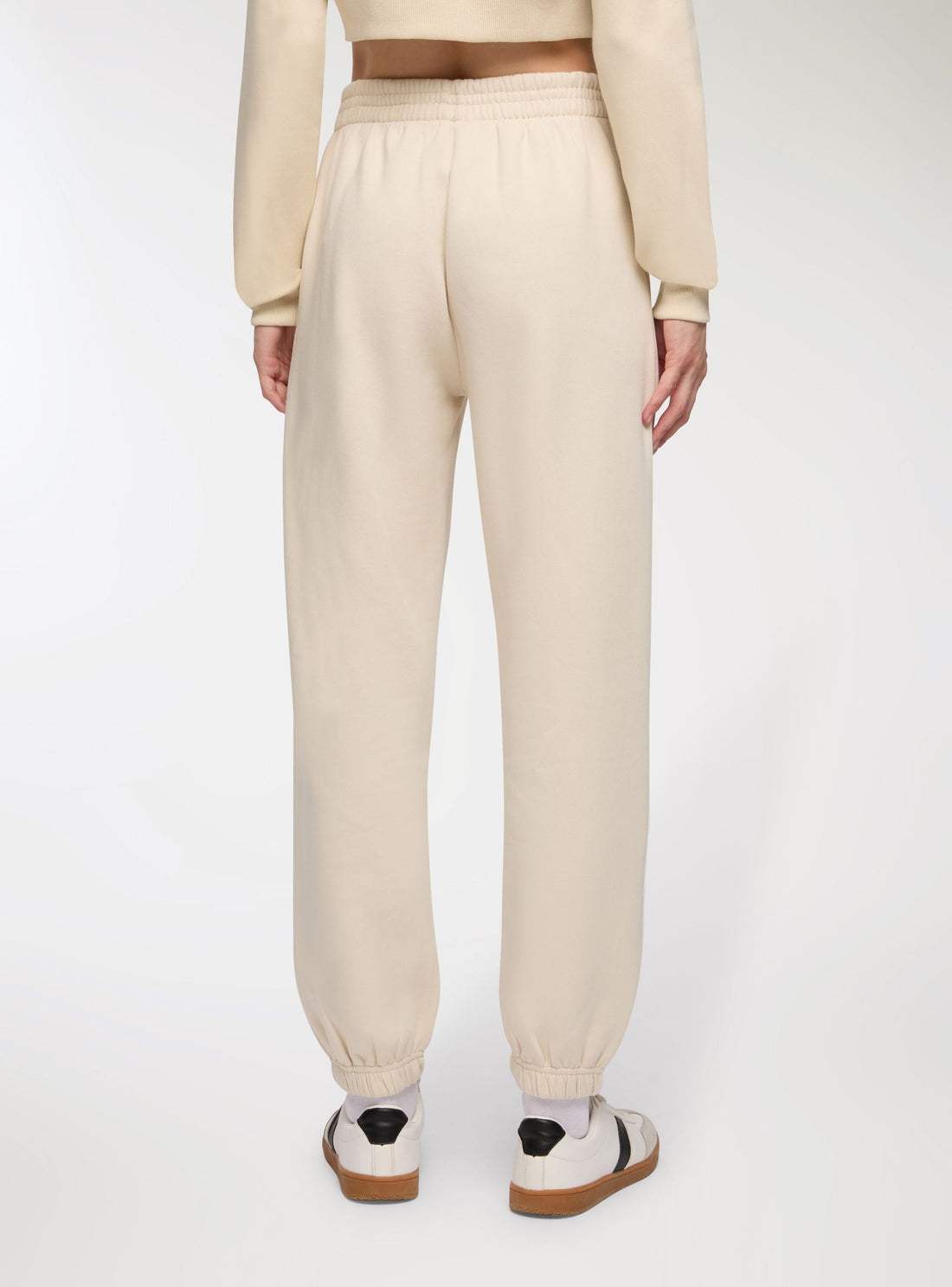 Pantaloni tuta vita alta con polsini