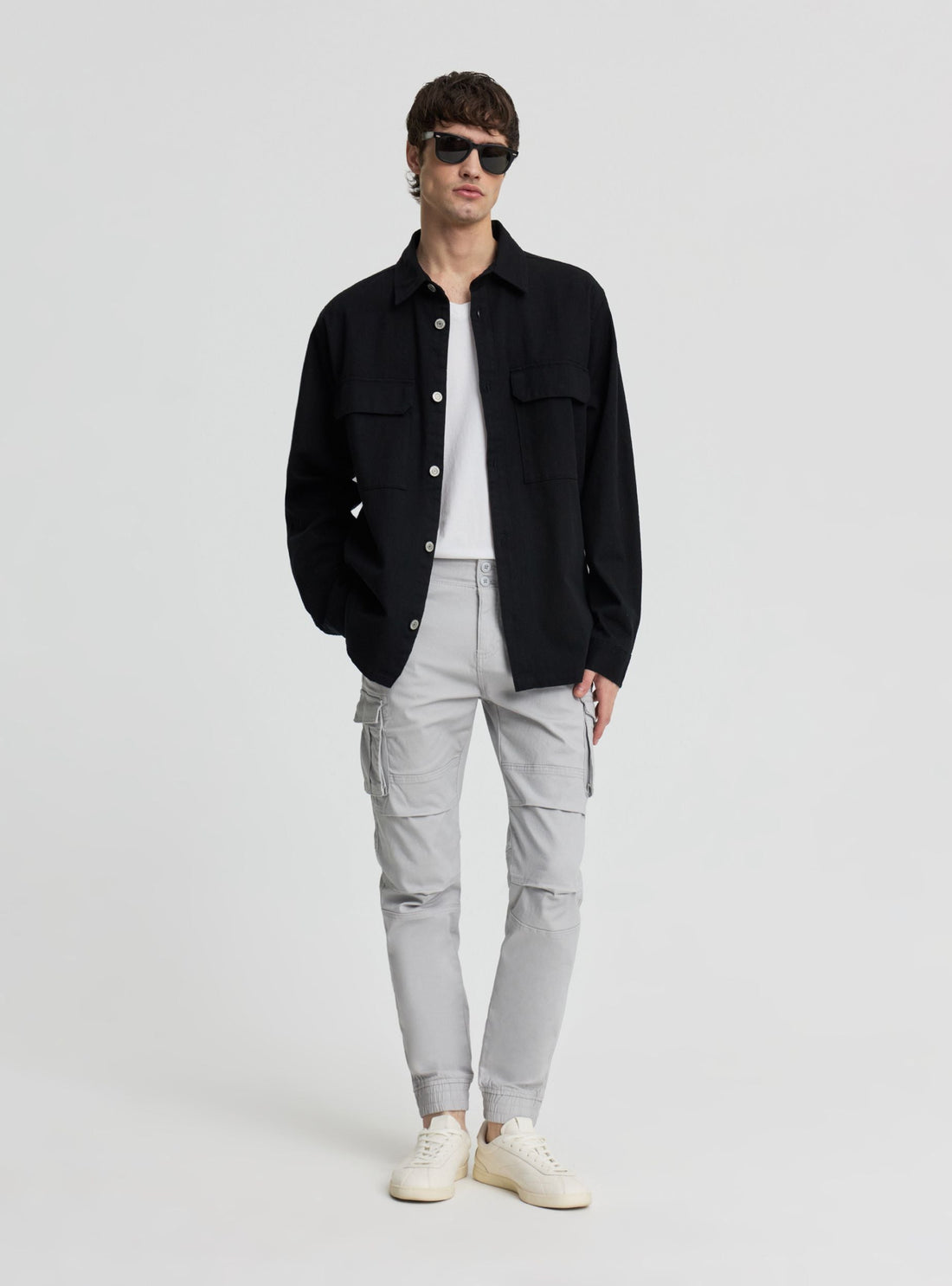 Pantaloni cargo con polsini