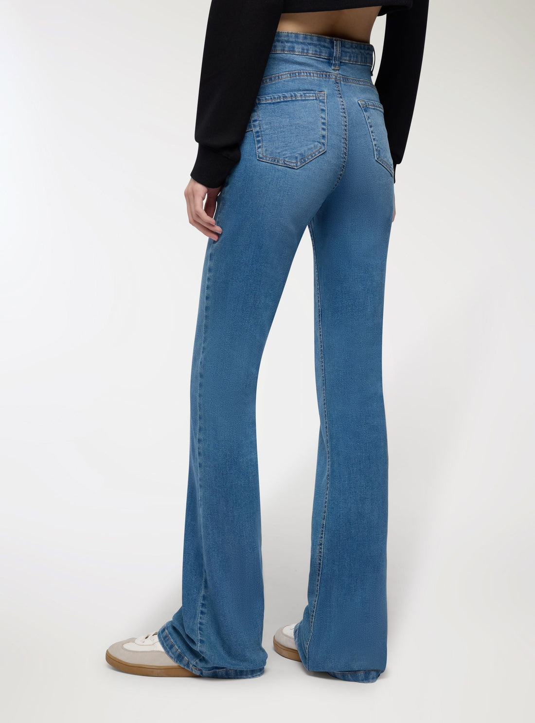 Jeans zampa a vita alta