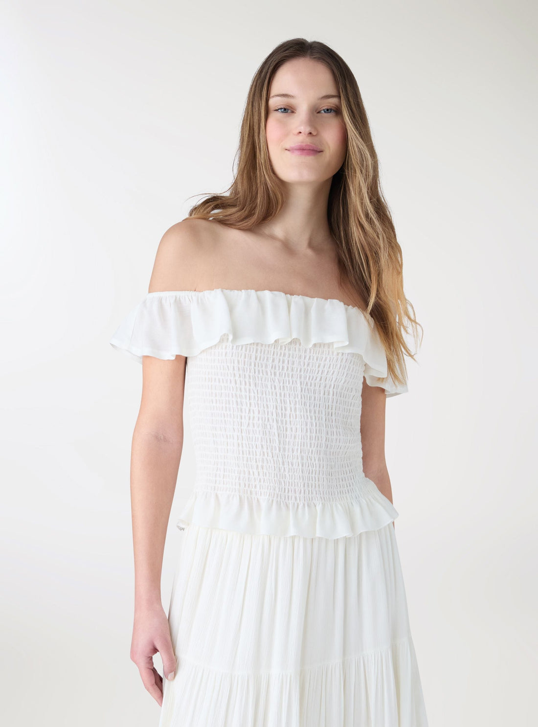 Blusa a spalle scoperte con balza