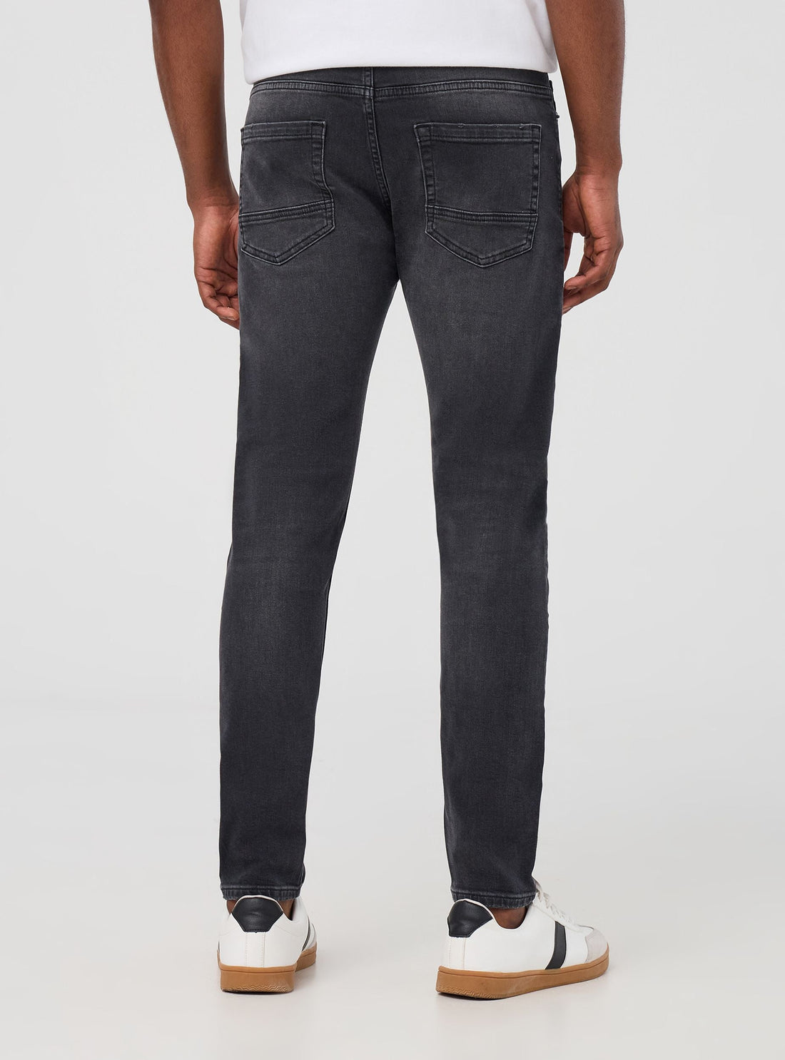 Jeans skinny con strappi piccoli