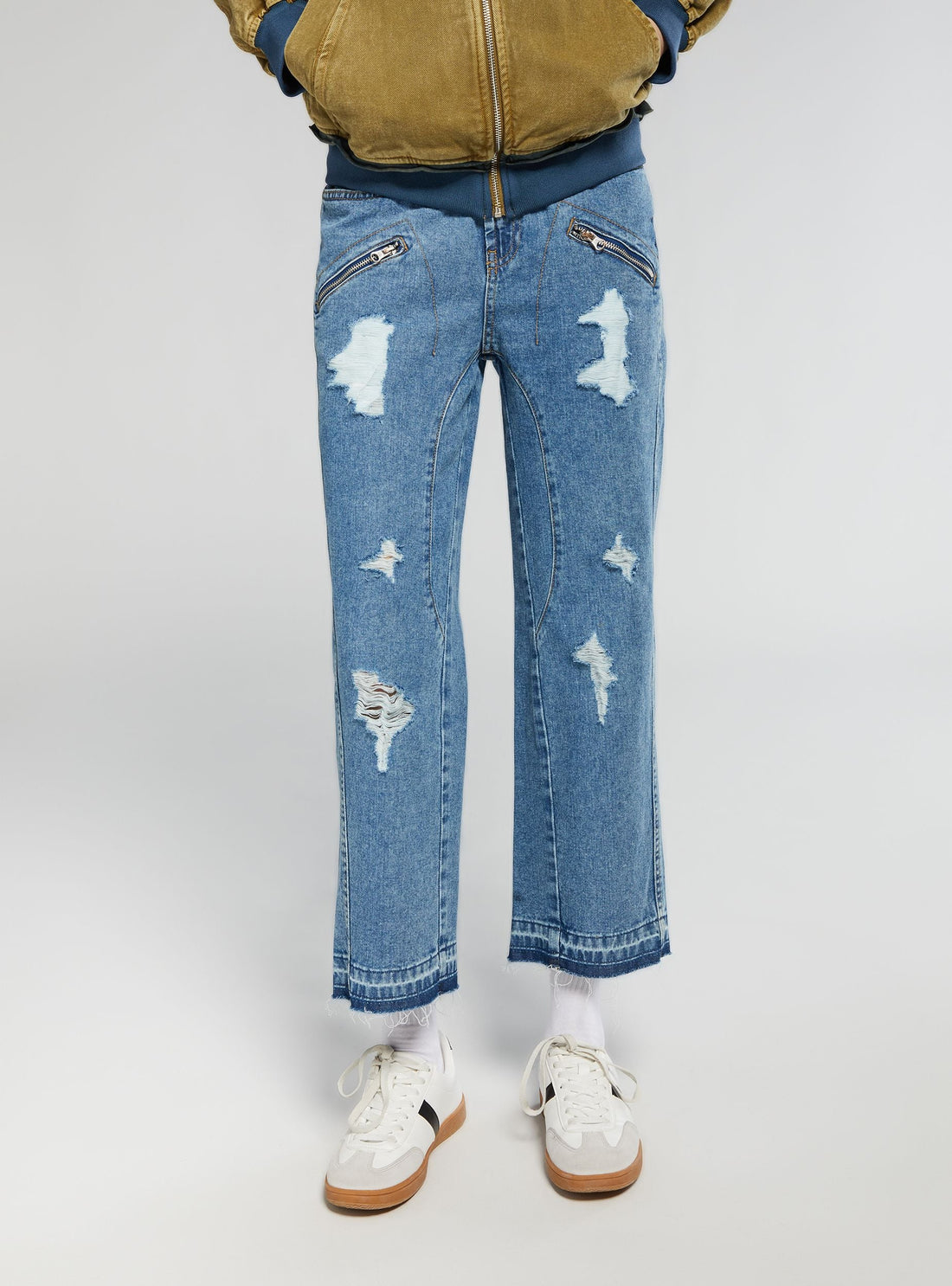 Jeans regular con coulisse, zip e strappi TRNPOPLAB