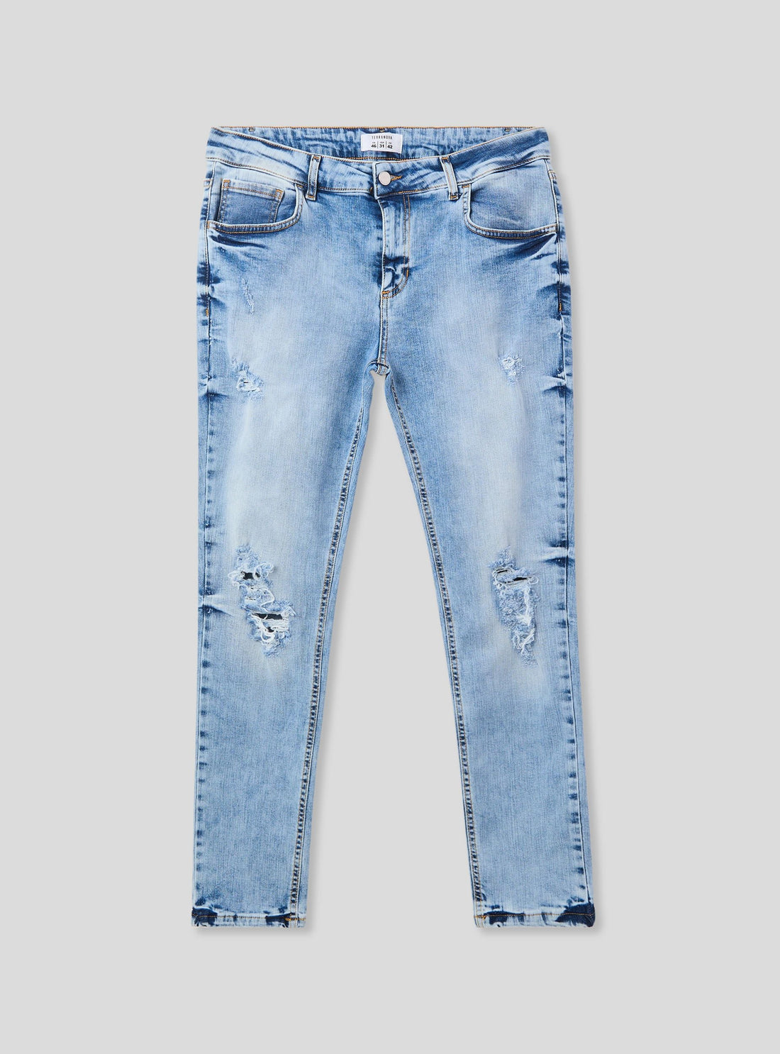 Jeans skinny strappati