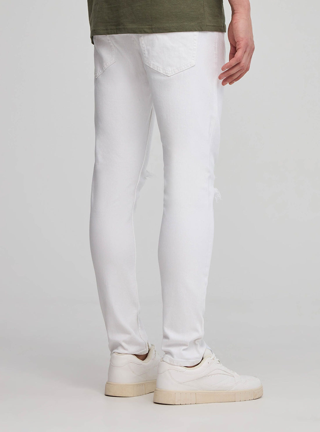 Jeans skinny con strappi