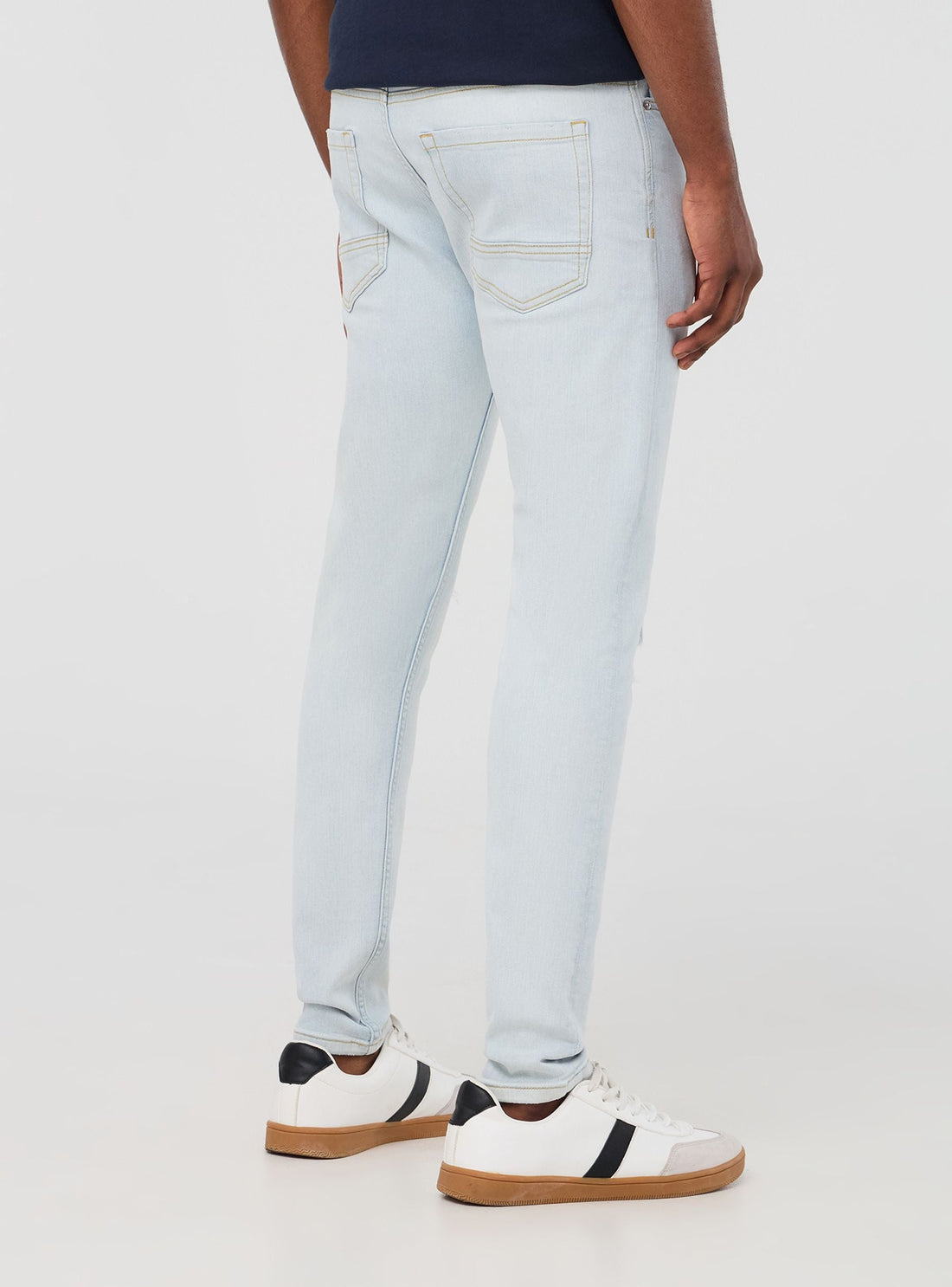 Jeans skinny chiari con strappi