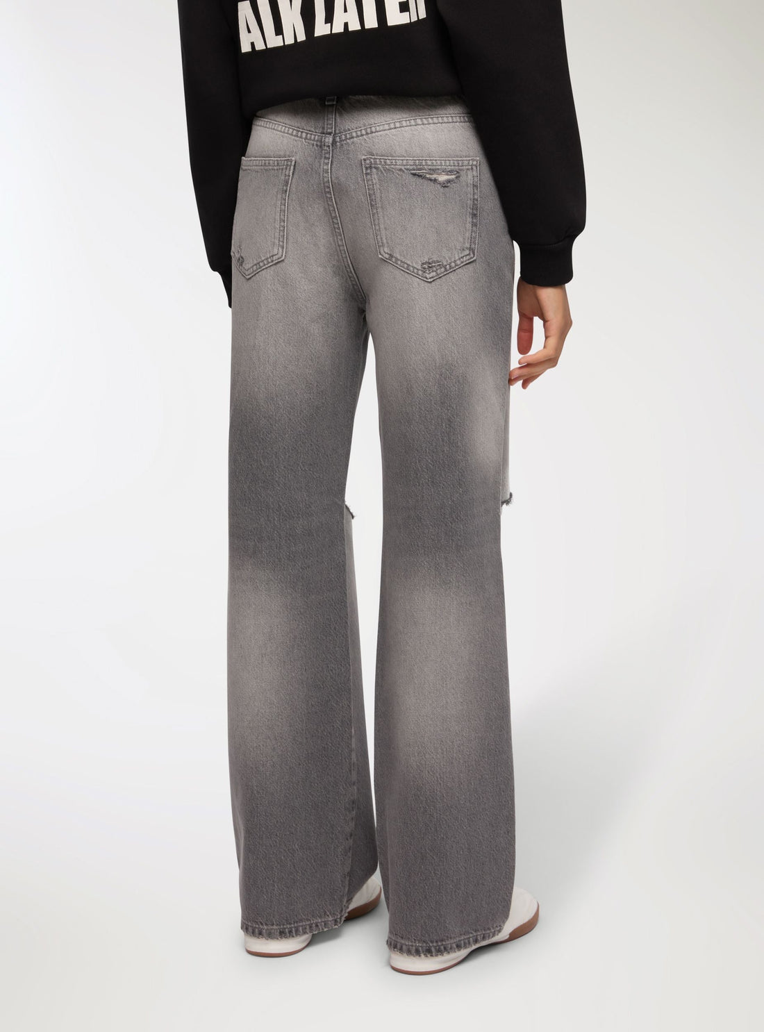 Jeans con strappi wide leg