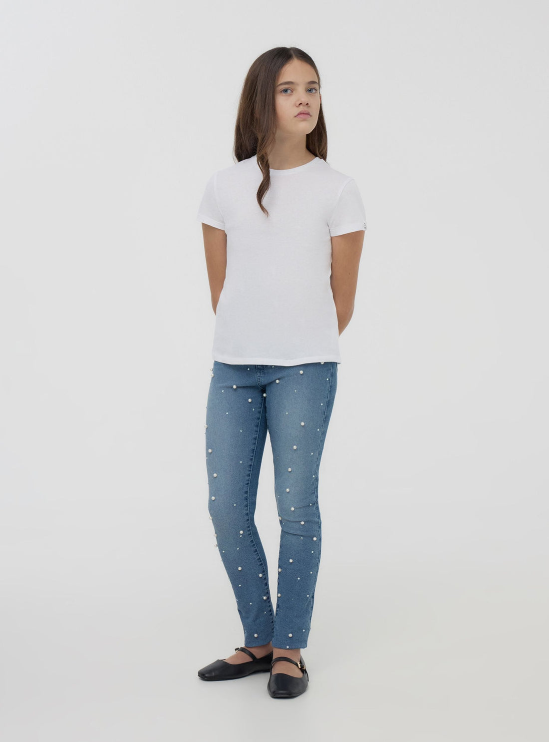 Jeans skinny con perle