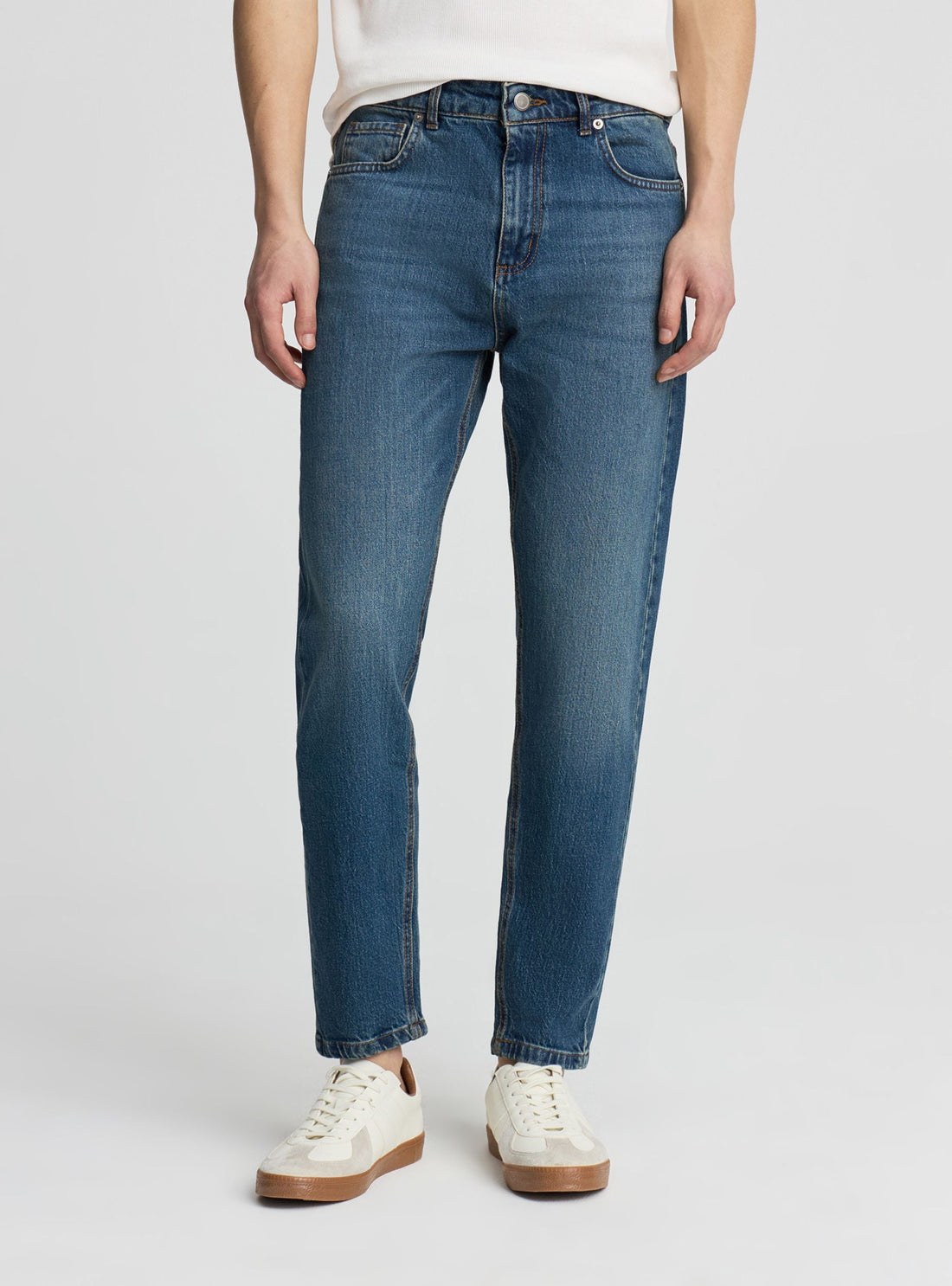 Jeans slim tapered a tinta unita