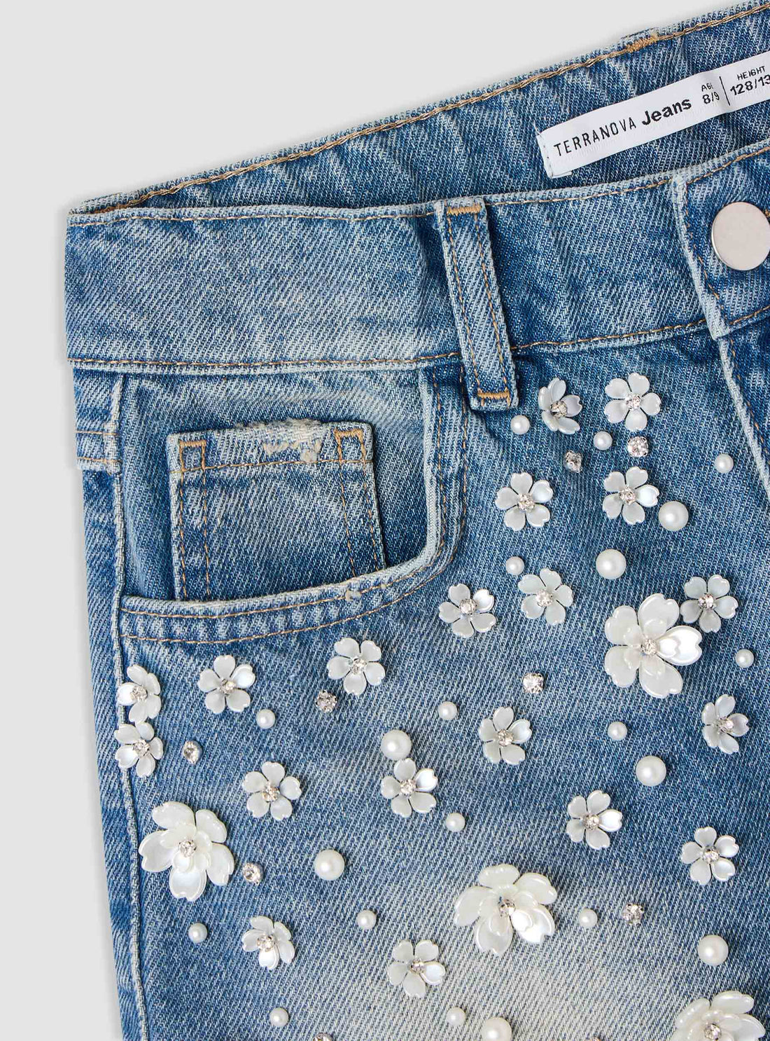 Shorts jeans con applicazioni floreali