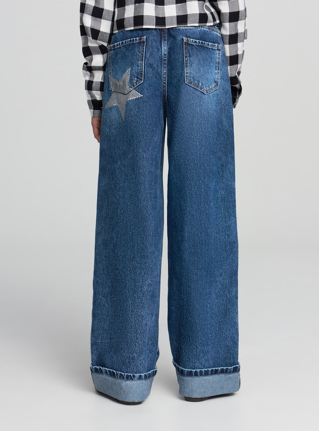 Jeans wide leg con applicazione stella