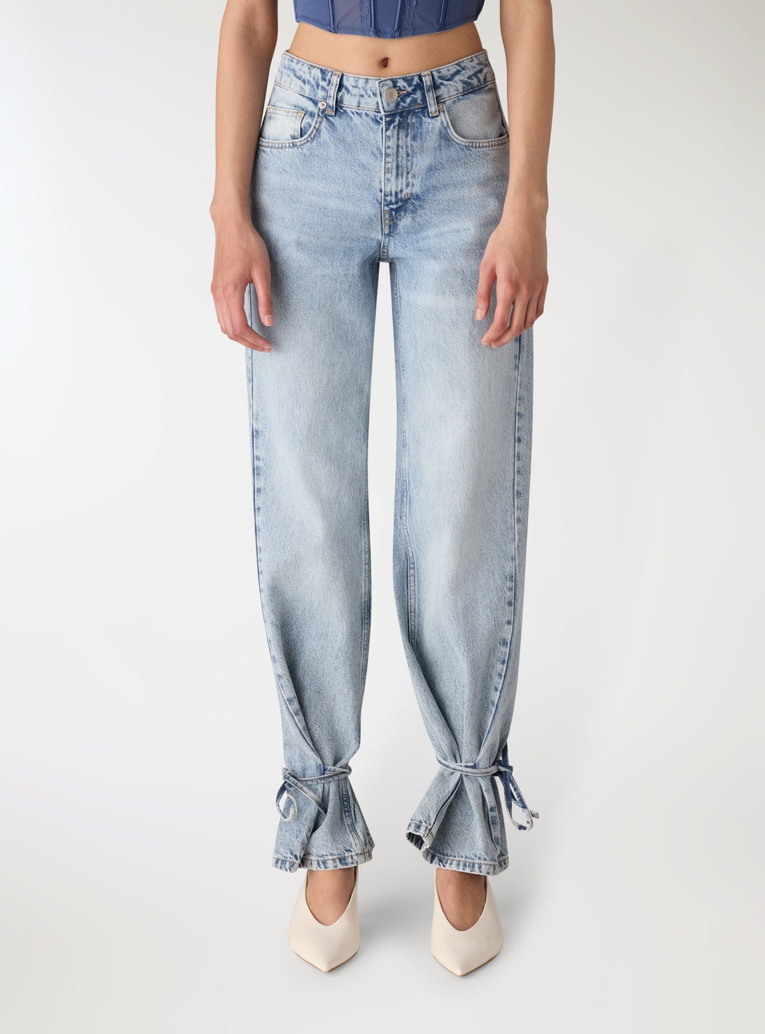 Jeans straight con lacci al fondo