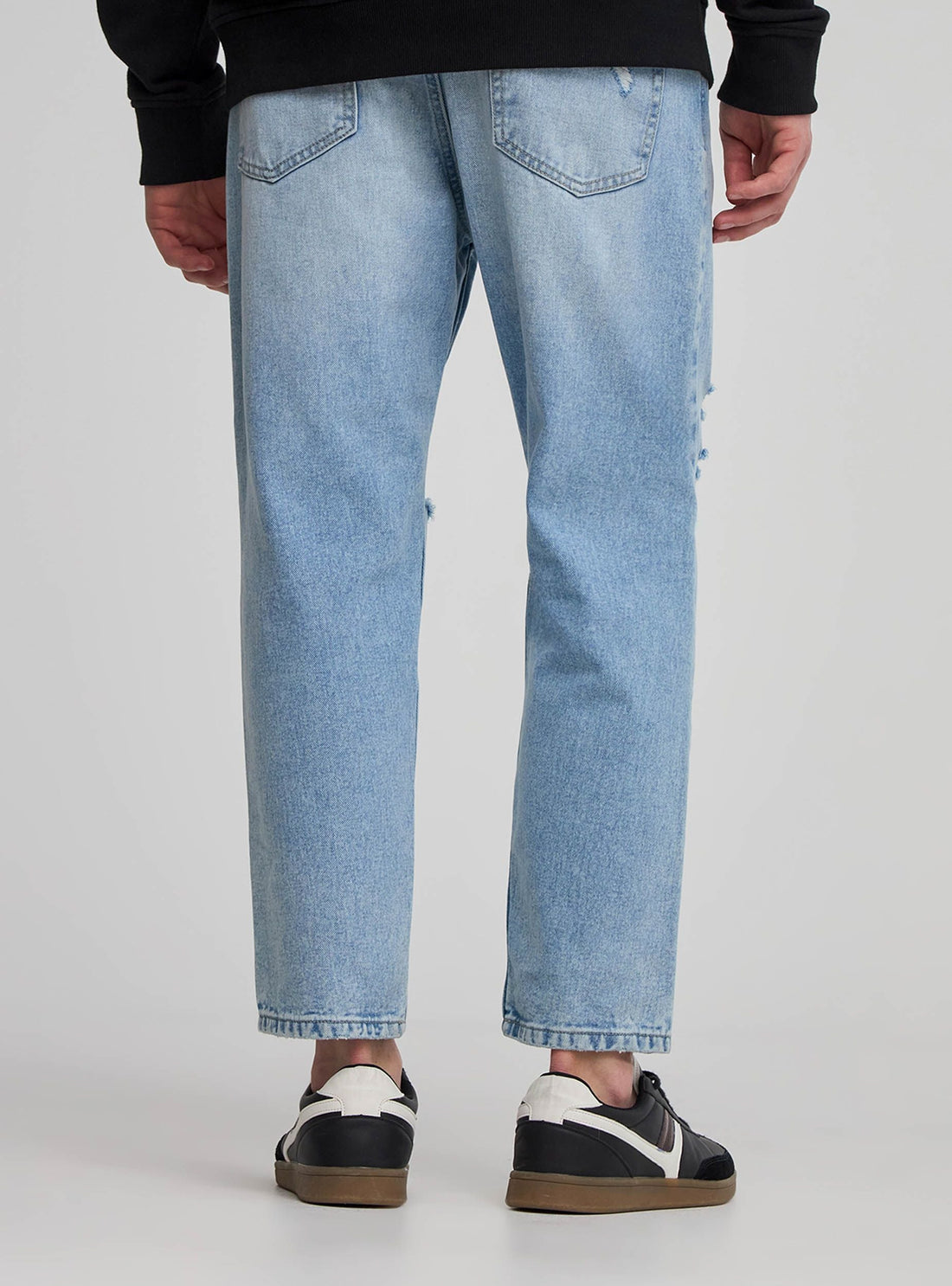 Jeans loose fit con strappi