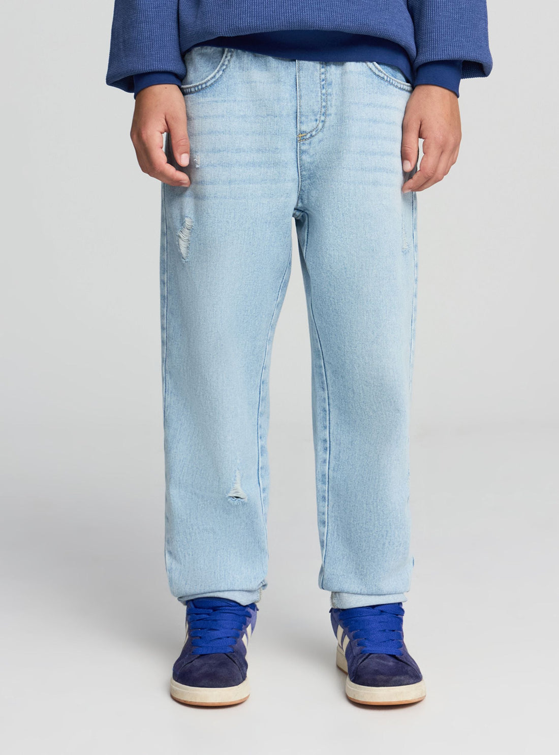 Jeans jogger con strappi