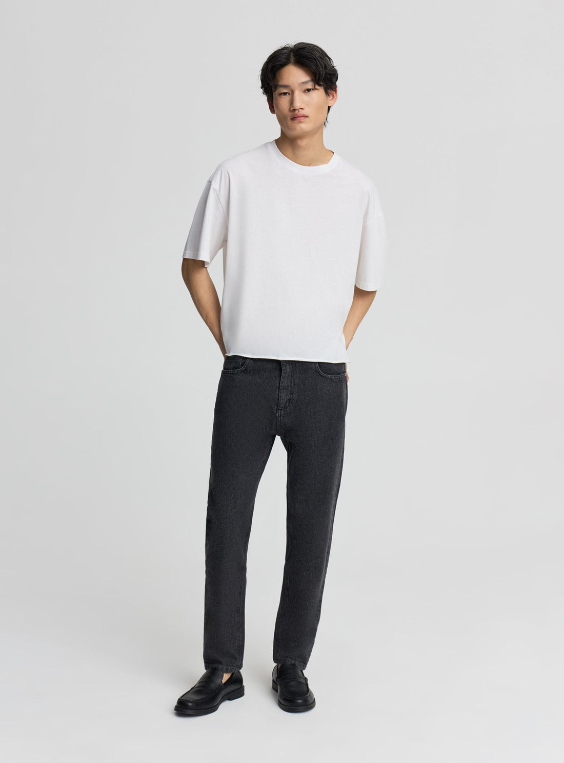 Jeans slim a tinta unita