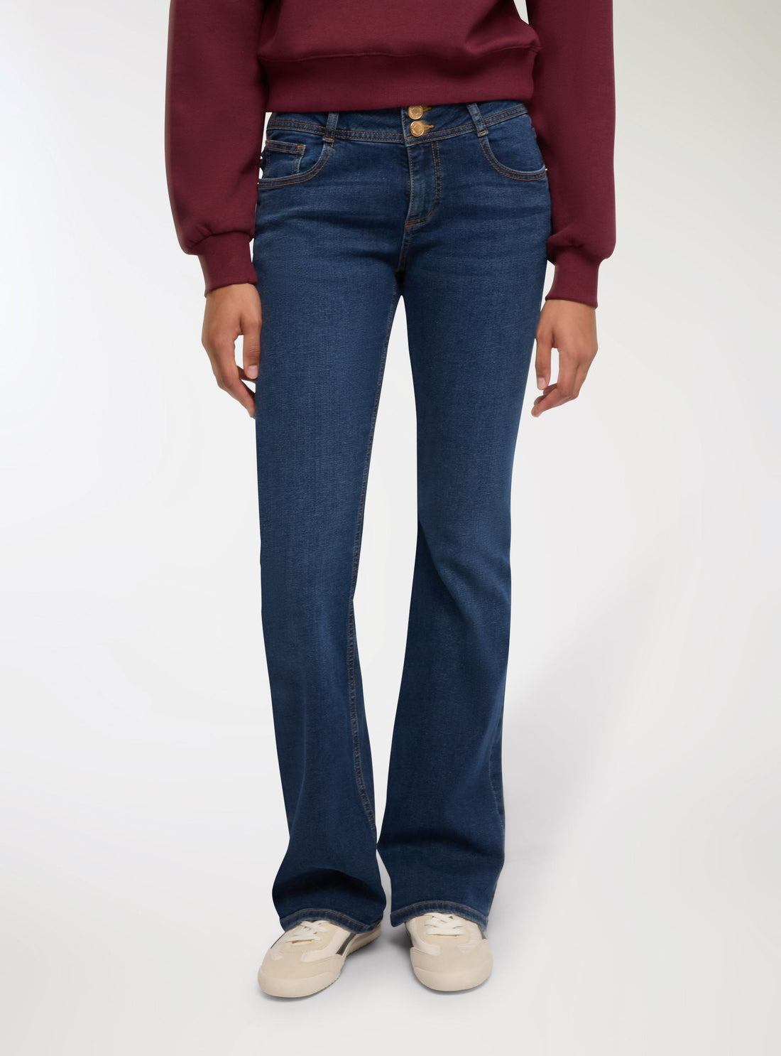 Jeans zampa a vita bassa